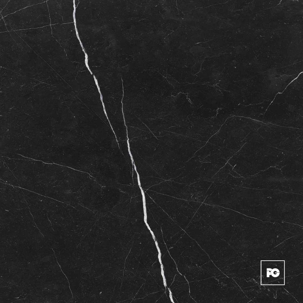 Piso cerámico brillante color negro formato 44x44, modelo Mármol Radu.
